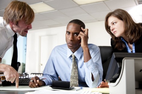 Managers scolding an employee