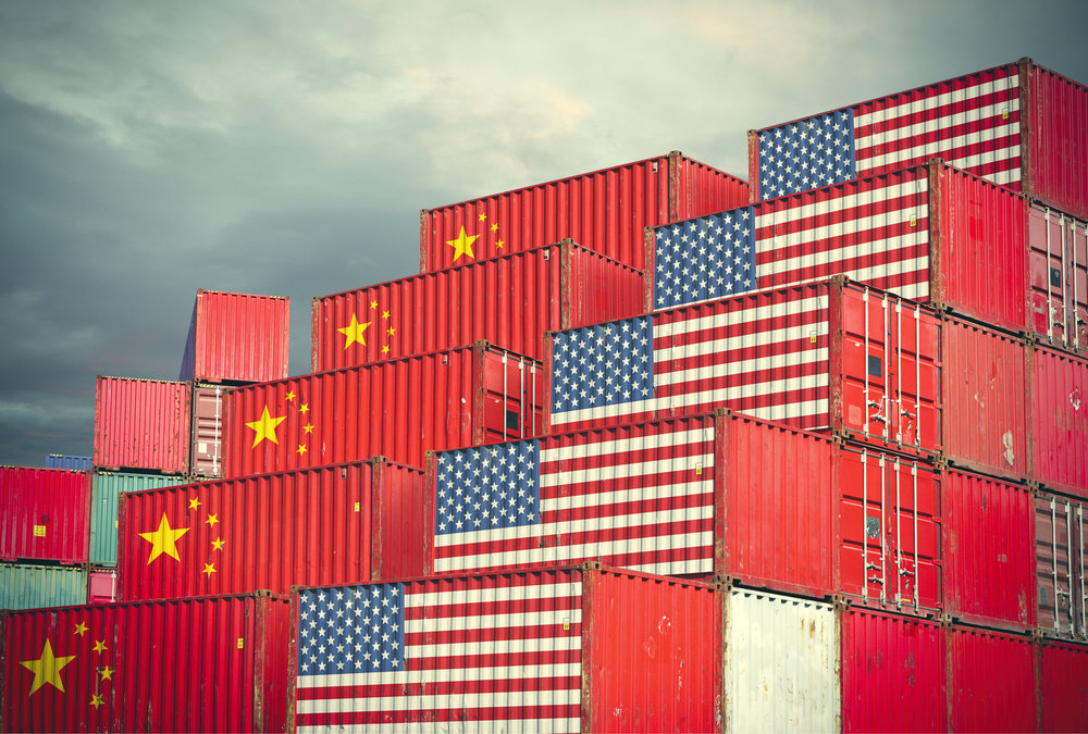 Chinese and United Stases cargo containers reflecting trade war and restrictions in export and import